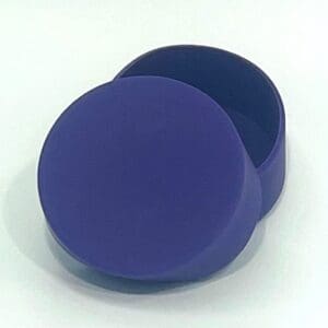 A blue round box sitting on top of a table.