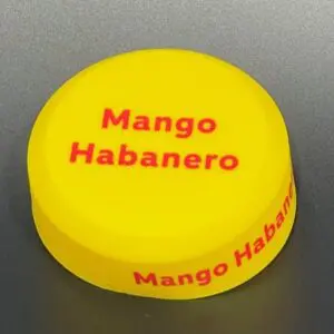 Yellow container lid with "Mango Habanero" text.