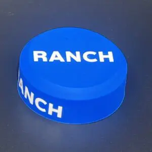 Blue hockey puck with "RANCH" text.