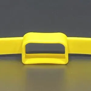 Yellow plastic tool on black background.