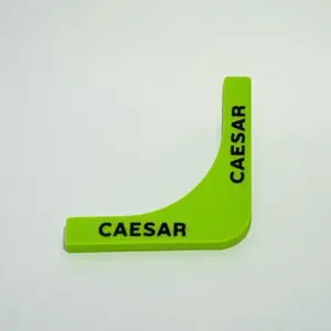 Green L-shaped object with "CAESAR" text.