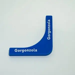 Blue Gorgonzola-shaped cheese corner piece.