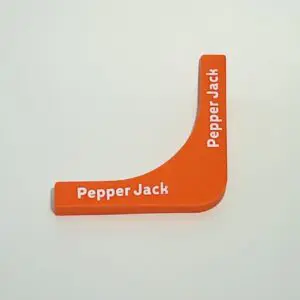 Orange Pepper Jack cheese slicer tool.