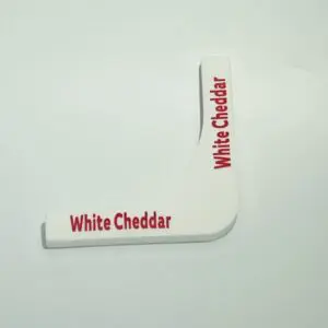 White Cheddar cheese label on white background.