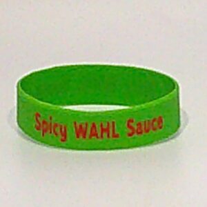 Green bracelet with "Spicy WAHL Sauce" text.