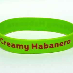 Green wristband with "Creamy Habanero" text.
