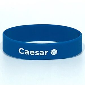 Blue wristband with "Caesar VG" text.