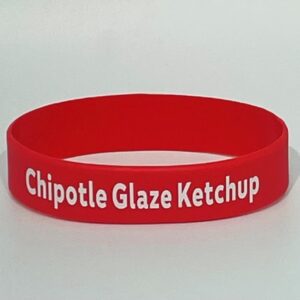 Red wristband labeled "Chipotle Glaze Ketchup".