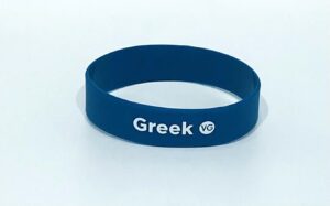 Blue wristband with "Greek VG" text.