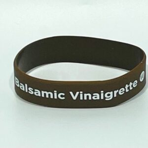 Brown wristband with "Balsamic Vinaigrette" text.