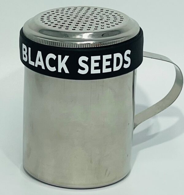 A black seeds shaker with the lid off.