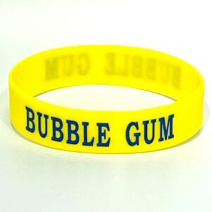 Yellow wristband with "BUBBLE GUM" text.