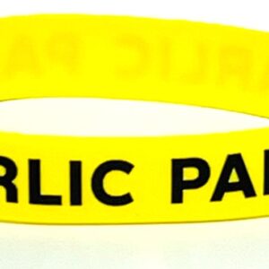 A yellow bracelet with the words garlic paste written on it.