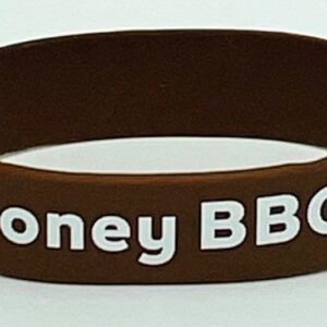 A brown bracelet with the words honey bbq written on it.