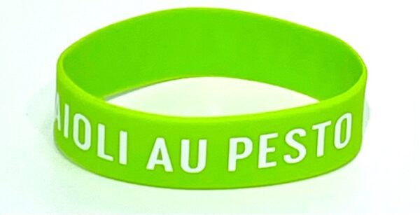 A green bracelet with the words " mali au peste ".