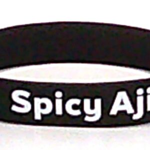 A black bracelet with the words spicy ajaira on it.