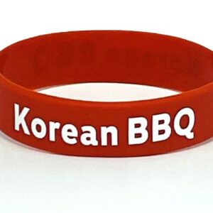 Red wristband with "Korean BBQ" text.