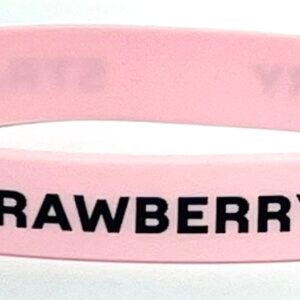 A pink bracelet with the word strawberry written on it.