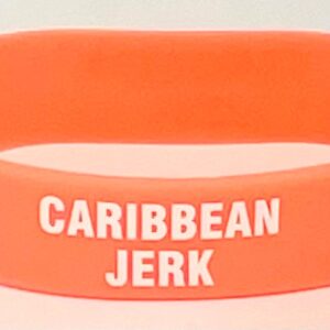 A close up of the side of an orange wristband