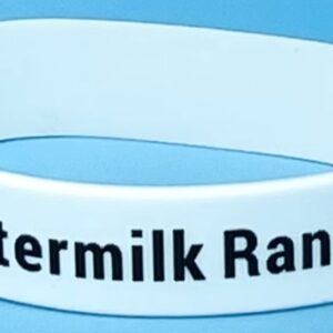 A white bracelet with the words " watermilk ranch ".