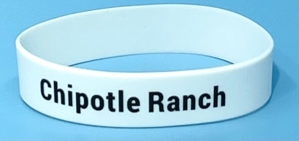 A white bracelet with the words " chipotle ranch ".