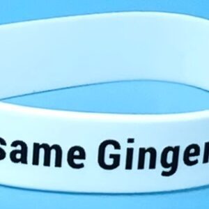 A white wristband with the same ginger name on it.