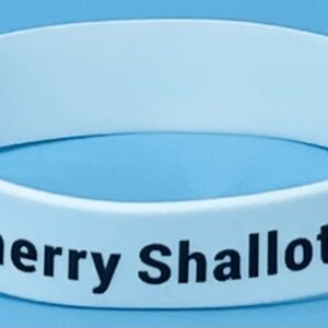 A white bracelet with the words " cherry shallotte ".