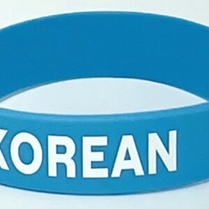 A blue wristband with the word " korean " written on it.