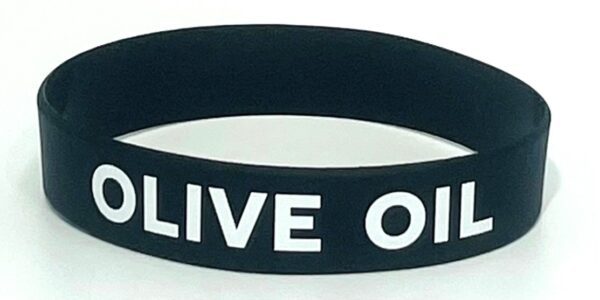 A black and white wristband with the words live on.