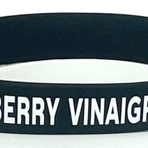 A black and white wristband with the words berry vinaigar written on it.
