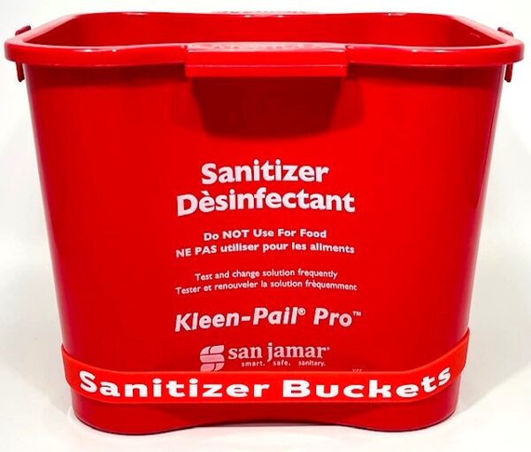 A red bucket with sanitizer in it.