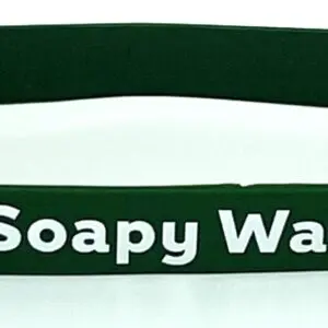 A green rubber bracelet with the words soapy water on it.