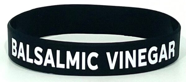 A black wristband with the words " dalmic vintner ".