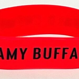 A red wristband with the name amy buffalo written on it.