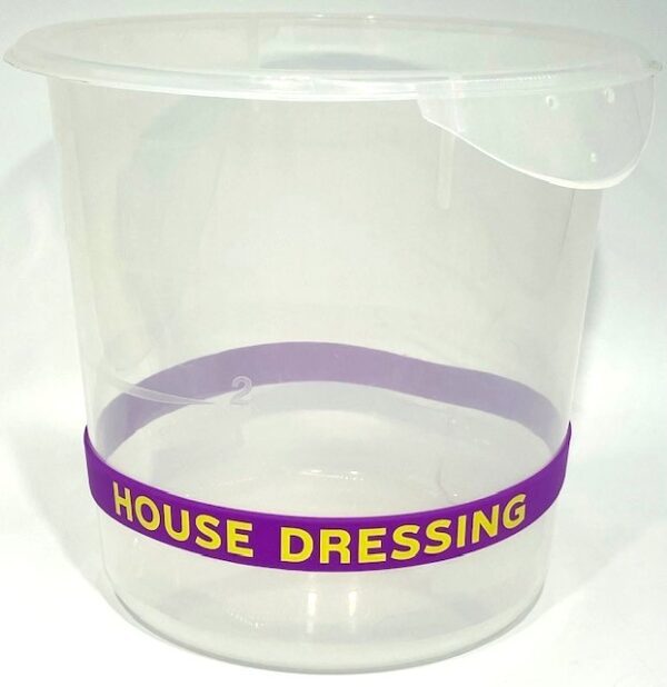 A plastic container with the words house dressing written on it.