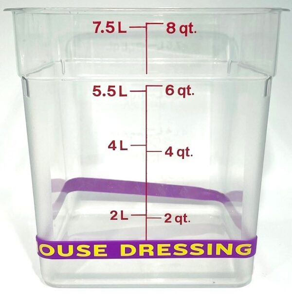 A plastic container with the words " house dressing ".