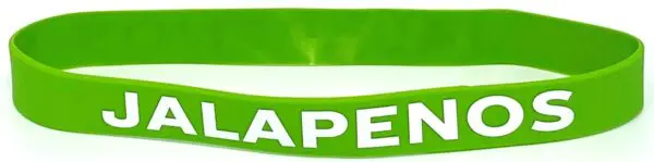 A green bracelet with the word " paper ".