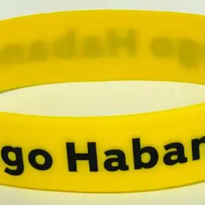 A yellow bracelet with the words " go habanos ".