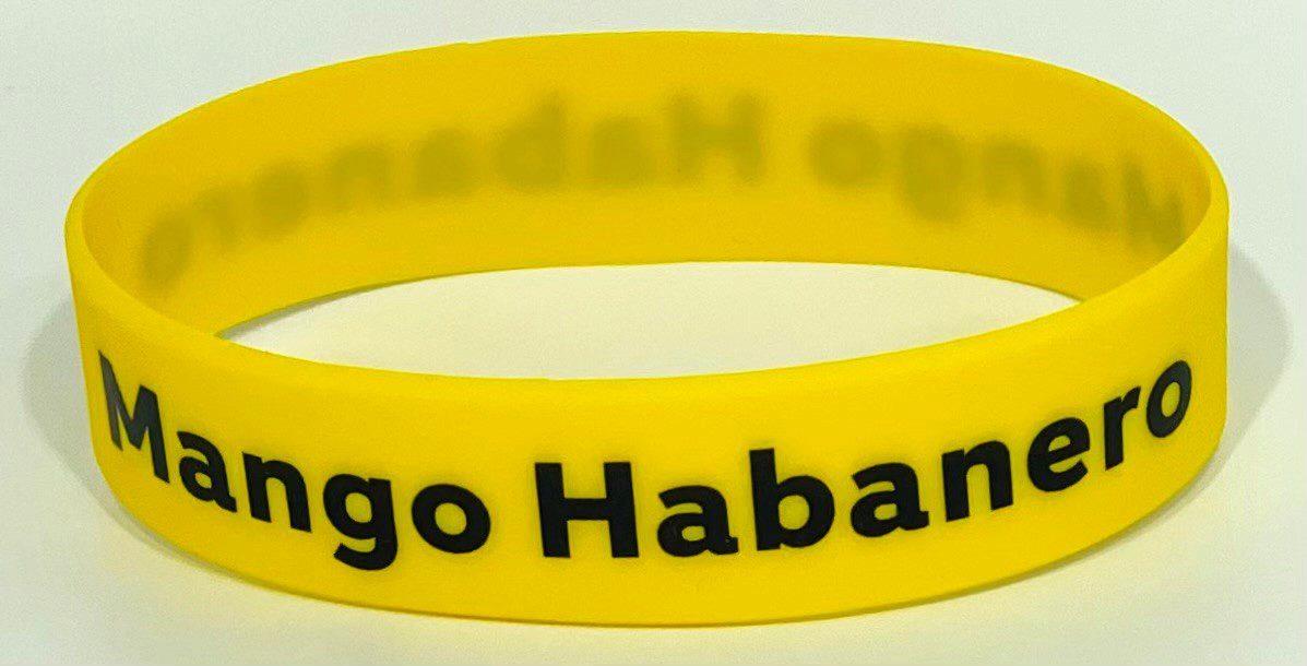 A yellow bracelet with the words " go habanos ".