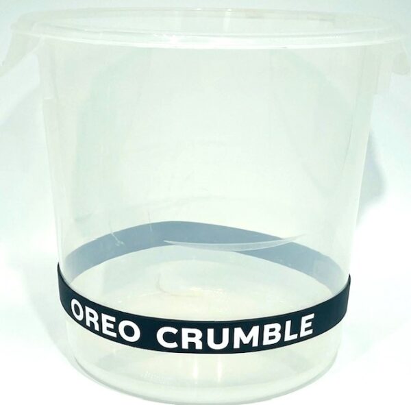 A plastic container with the words oreo crumble on it.