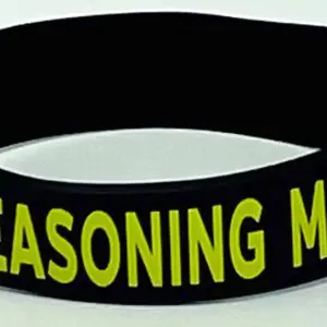 A black and yellow bracelet with the words " reasoning matters ".
