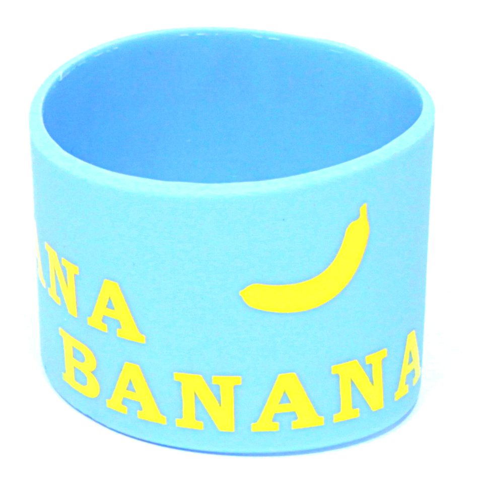 A blue wristband with the words " banana " written on it.