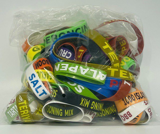 A bag of assorted stickers and ribbons