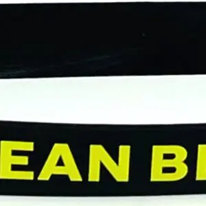 A black headband with yellow letters on it.