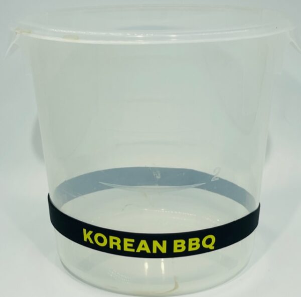 A plastic container with korean bbq written on it.