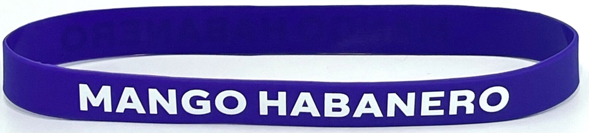 A purple wristband with the words " go haba " written on it.