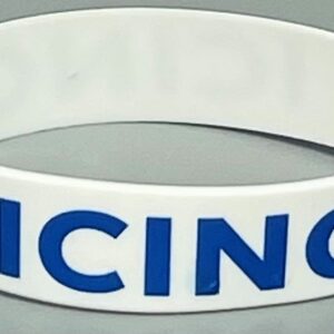A white and blue wristband with the word " racing ".