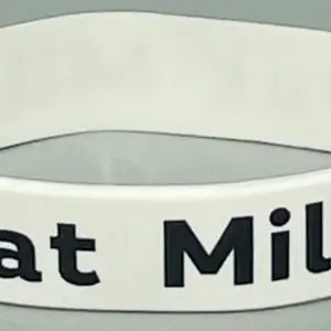 A white bracelet with the words " eat milk ".