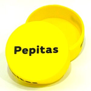 A yellow container with the word pepitas written on it.