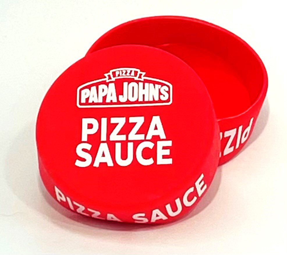 A red box with the words papa johns pizza sauce on it.